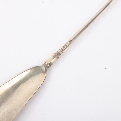 1777 - A Chinese export silver combination shoe horn/button hook, retailed by Luen Hing, circa 1910, with A... 