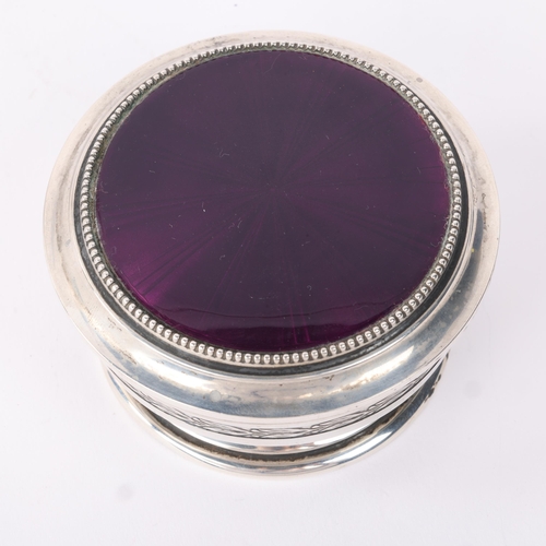 1784 - An Art Deco Continental silver purple enamel dressing table powder box and cover, circular form with... 