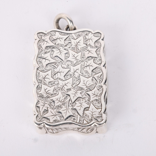 1794 - A Victorian silver vinaigrette, George Unite, Birmingham 1883, shaped rectangular form with allover ... 