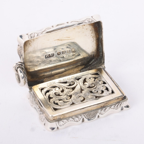 1794 - A Victorian silver vinaigrette, George Unite, Birmingham 1883, shaped rectangular form with allover ... 