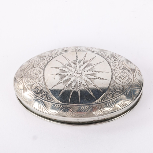 1797 - An Antique 18th century silver plated snuffbox, oval form with engraved spiral and star decoration, ... 