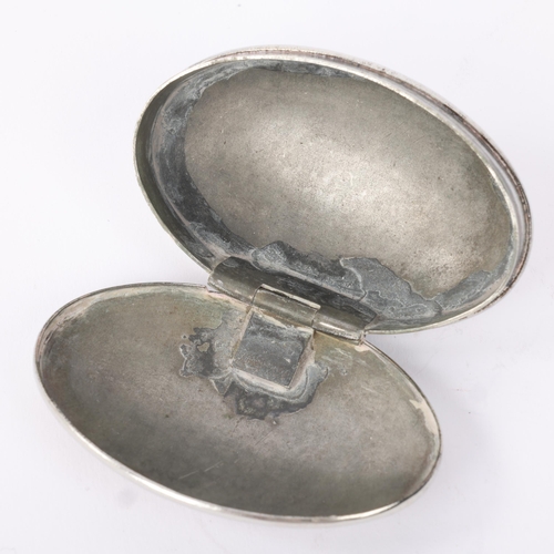 1797 - An Antique 18th century silver plated snuffbox, oval form with engraved spiral and star decoration, ... 