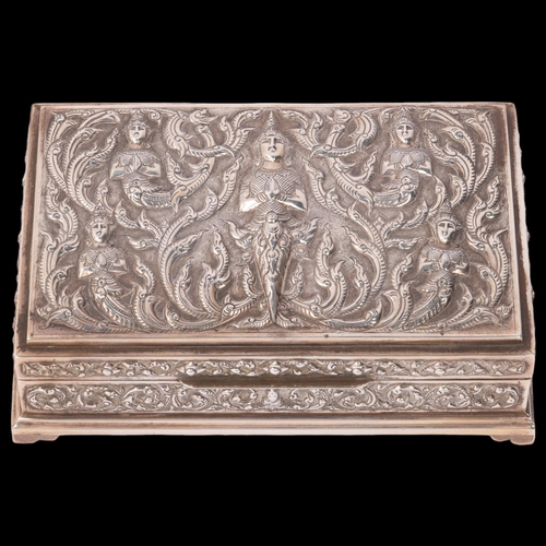 1800 - A Siam sterling silver 'Avatar' cigarette box, rectangular form with allover relief embossed deity a... 