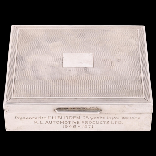 1801 - An Elizabeth II silver cigarette box, SJ Rose, London 1970, slimline rectangular form with engine tu... 