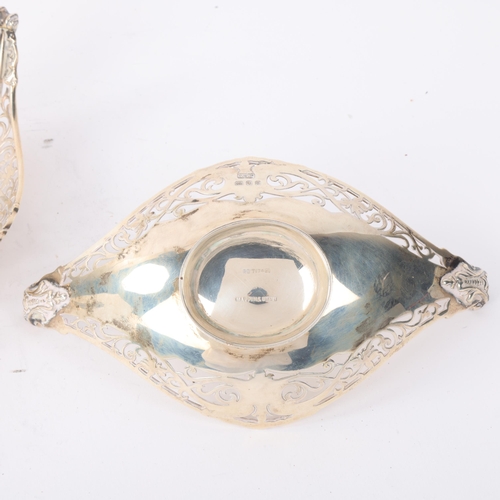 1819 - A pair of George V silver bon bon baskets, Mappin & Webb, London 1930, boat form with relief embosse... 