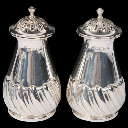 1840 - A pair of late Victorian silver pepperettes, Lee & Wigfull, Sheffield 1897, tapered cylindrical form... 