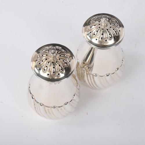 1840 - A pair of late Victorian silver pepperettes, Lee & Wigfull, Sheffield 1897, tapered cylindrical form... 