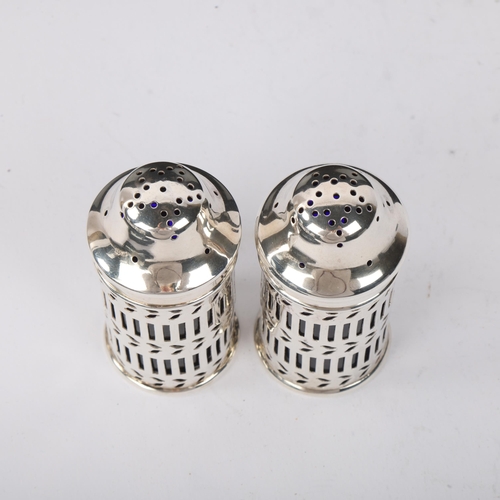 1841 - A pair of George V silver pepperettes, Willian Hutton & Sons Ltd, Birmingham 1923, cylindrical form ... 