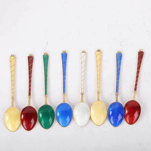 1864 - EGON LAURIDSEN - a set of 8 Danish vermeil sterling silver harlequin enamel coffee spoons, with enam... 