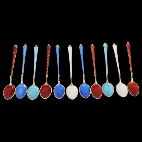 1866 - EGON LAURIDSEN - a set of 11 Danish vermeil sterling silver harlequin enamel coffee spoons, with ena... 