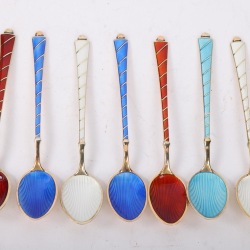 1866 - EGON LAURIDSEN - a set of 11 Danish vermeil sterling silver harlequin enamel coffee spoons, with ena... 