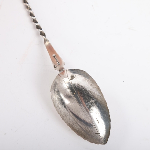 1871 - MARIUS HAMMER - a large Norwegian silver long-handled leaf spoon, with twisted handle and ball finia... 