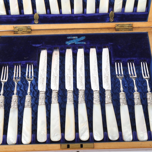 1888 - A cased set of late Victorian mother-of-pearl handled silver dessert cutlery for 12 people, Harrison... 