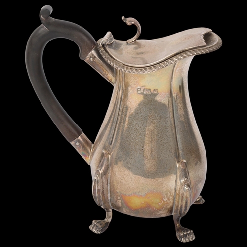 1896 - An Edwardian silver hot water jug, George Unite, Birmingham 1902, bulbous form with gadrooned rim, l... 