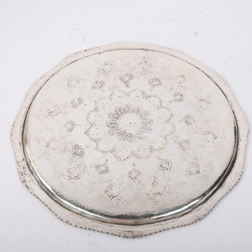 1907 - An Antique Persian silver tray, allover chased and engraved foliate decoration, with cast rim, unmar... 