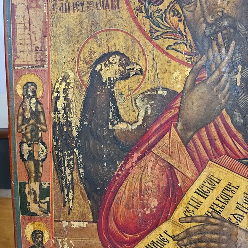 22 - Antique Russian icon, oil on wood panel depicting St John The Evangelist, 50cm x 38cm