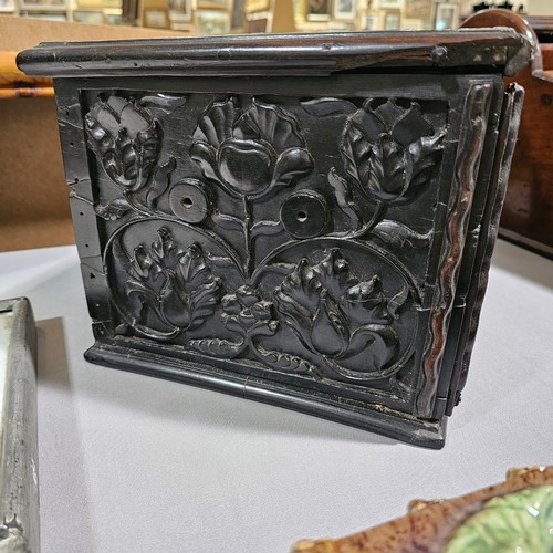 14 - An early 19th century Sri Lankan ebony box, circa 1830, relief carved allover with hinged lid and dr... 