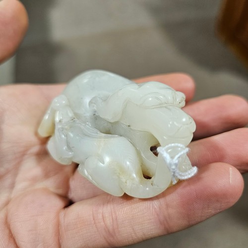 148 - A Chinese relief carved jade buffalo and calf, Qing Dynasty, length 7cm