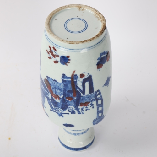 199 - A Chinese blue and red porcelain vase, decorated with figures, height 22cm