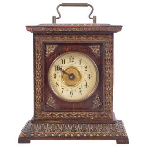 686 - A Vintage mantel clock with key in acanthus carved case, H17cm