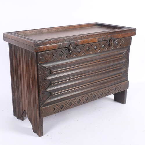 15 - An apprentice piece oak coffer, with a selection of different carved and applied decoration, includi... 