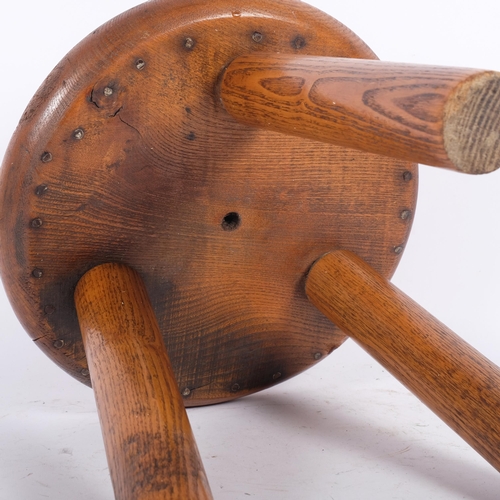 27 - An Antique elm stool, diameter 30cm, height 30cm