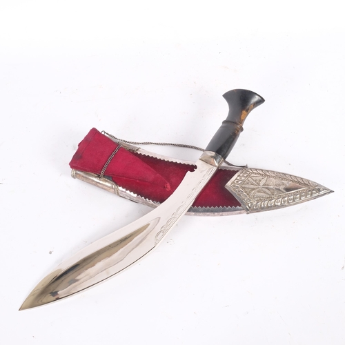 36 - A Nepalese ceremonial kukri knife with horn handle, and unmarked silver-mounted scabbard set with sm... 