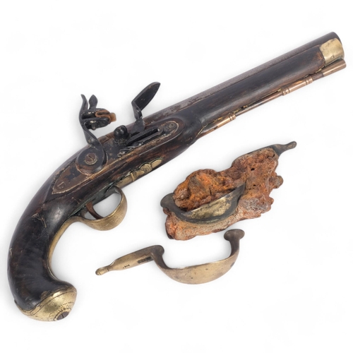 39 - 18th century brass-mounted flintlock pistol, originally trawled up in Rye Bay and made up as a displ... 