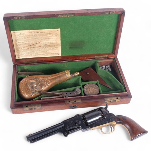 41 - A replica 1848 Colt DRAGOON, 3rd Model, .44cal.  , a 19th century brass and copper powder flask, and... 