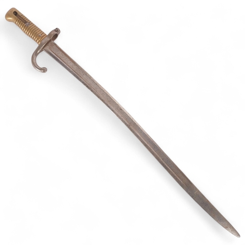 47 - An 1866 pattern French bayonet, steel guard and brass handle, guard numbered 8234, L69cm