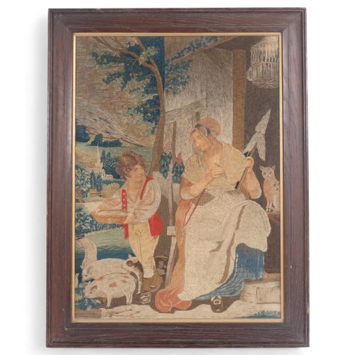 58 - A 19th century needlework depicting mother and child in a farmyard setting, oak-framed, 67cm x 51cm ... 