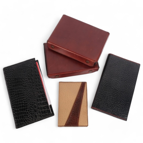 67 - 2 leather-cased travelling playing card cases, 2 leather address book covers, and another (5), all f... 