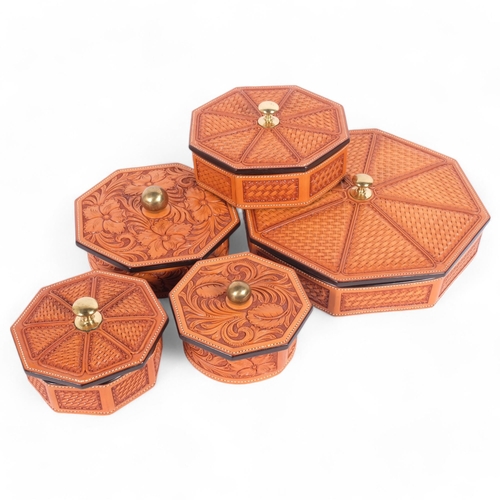 69 - A group of 5 tan tooled leather boxes and covers, of octagonal and circular form, widest 30cm, all f... 