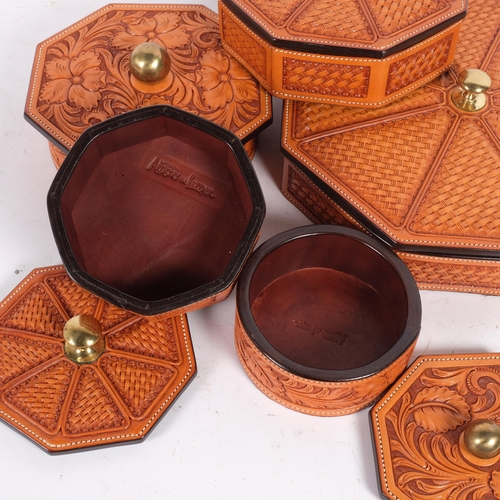 69 - A group of 5 tan tooled leather boxes and covers, of octagonal and circular form, widest 30cm, all f... 