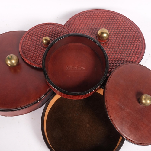 71 - 2 pairs of leather circular boxes and covers, 1 pair being of a woven wicker design, diameter 27cm, ... 