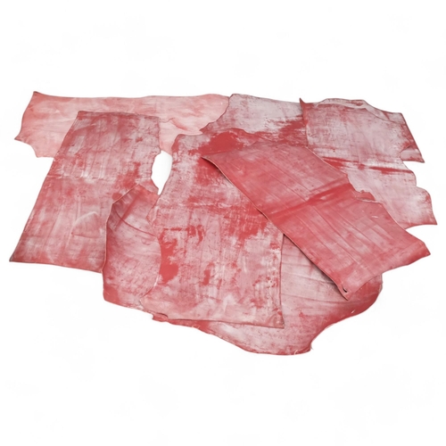 78 - Various rolls of red leather