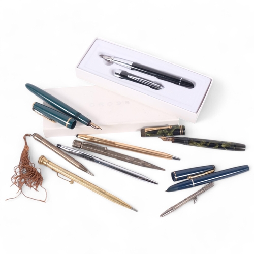 128 - A group of various pens, including a Cross fountain pen, boxed, a Parker and Duofold green marble fo... 