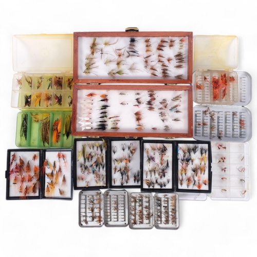 134 - A large quantity of cased fishing flies of varying designs (11)