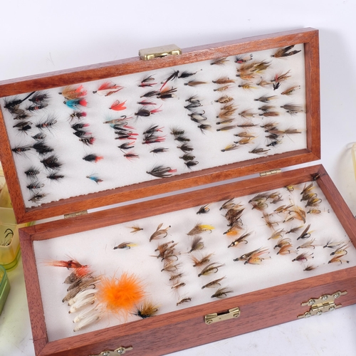 134 - A large quantity of cased fishing flies of varying designs (11)