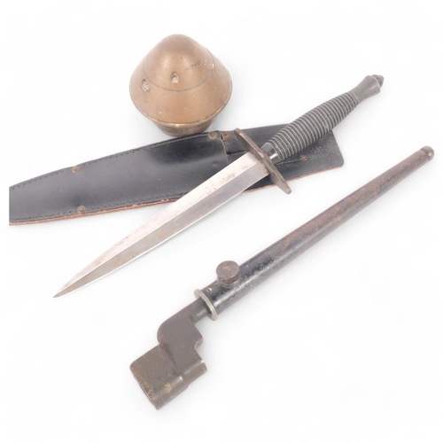 142 - A British 2nd pattern Commando dagger, with ribbed handle, steel blade etched J Nowill & Sons, Sheff... 