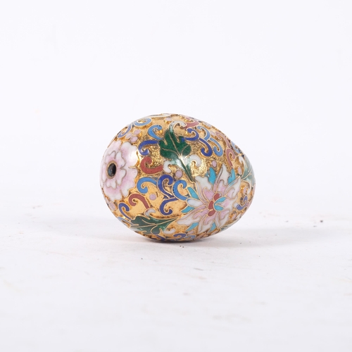 150 - A decorative gilded cloisonne egg