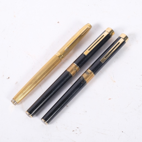 156 - A Sheaffer fountain pen with 14ct nib, a Sheaffer fountain pen with steel nib, and a Parker gold pla... 