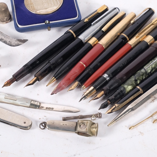 158 - A collection of various fountain pens, including a Mabie Todd & Company Ltd green marble-bodied 