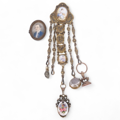 162 - An Antique ornate brass chatelaine, with various accoutrements, including gilt-metal and agate seal,... 