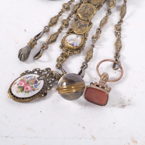 162 - An Antique ornate brass chatelaine, with various accoutrements, including gilt-metal and agate seal,... 