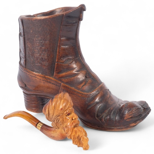 166 - An early 20th century carved treen boot, H16cm, and a Meerschaum pipe with a bowl in the form of a S... 