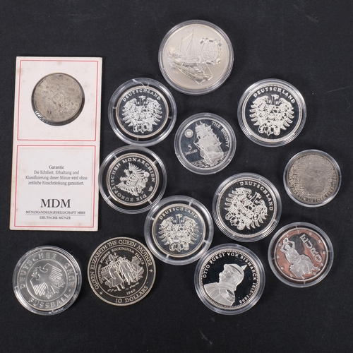 174 - 13 various commemorative coins, subjects to include composers, etc