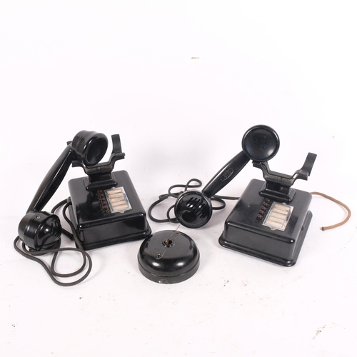 214 - A pair of Antique Bakelite telephones