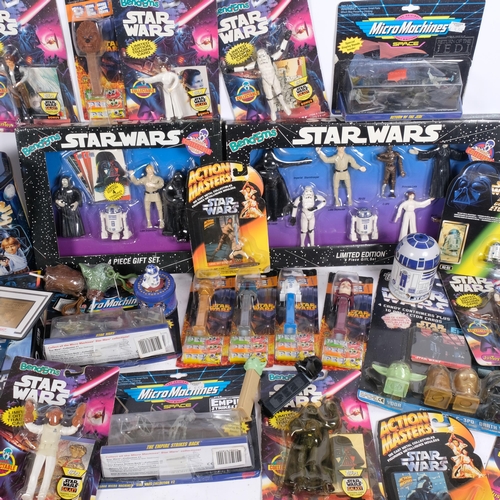 225 - A collection of unused Star Wars figurines and others, including Admiral Akbar, Storm Trooper, Han S... 