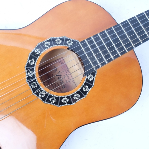 254 - A Valencia half-size Classical guitar, model no. CG1K 1/2/NA, serial no. 8201499, labelled to inside